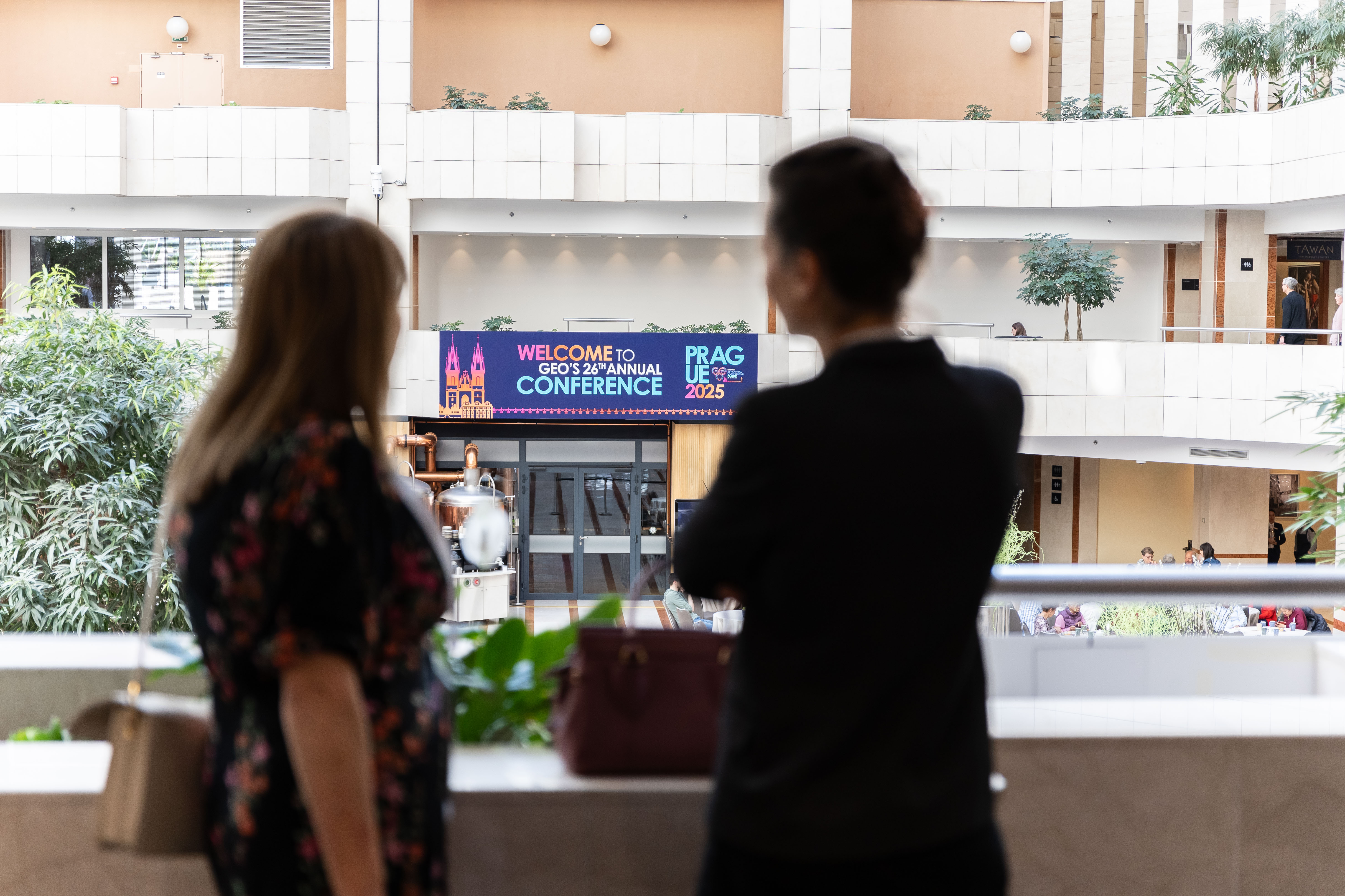 ladies looking at sign