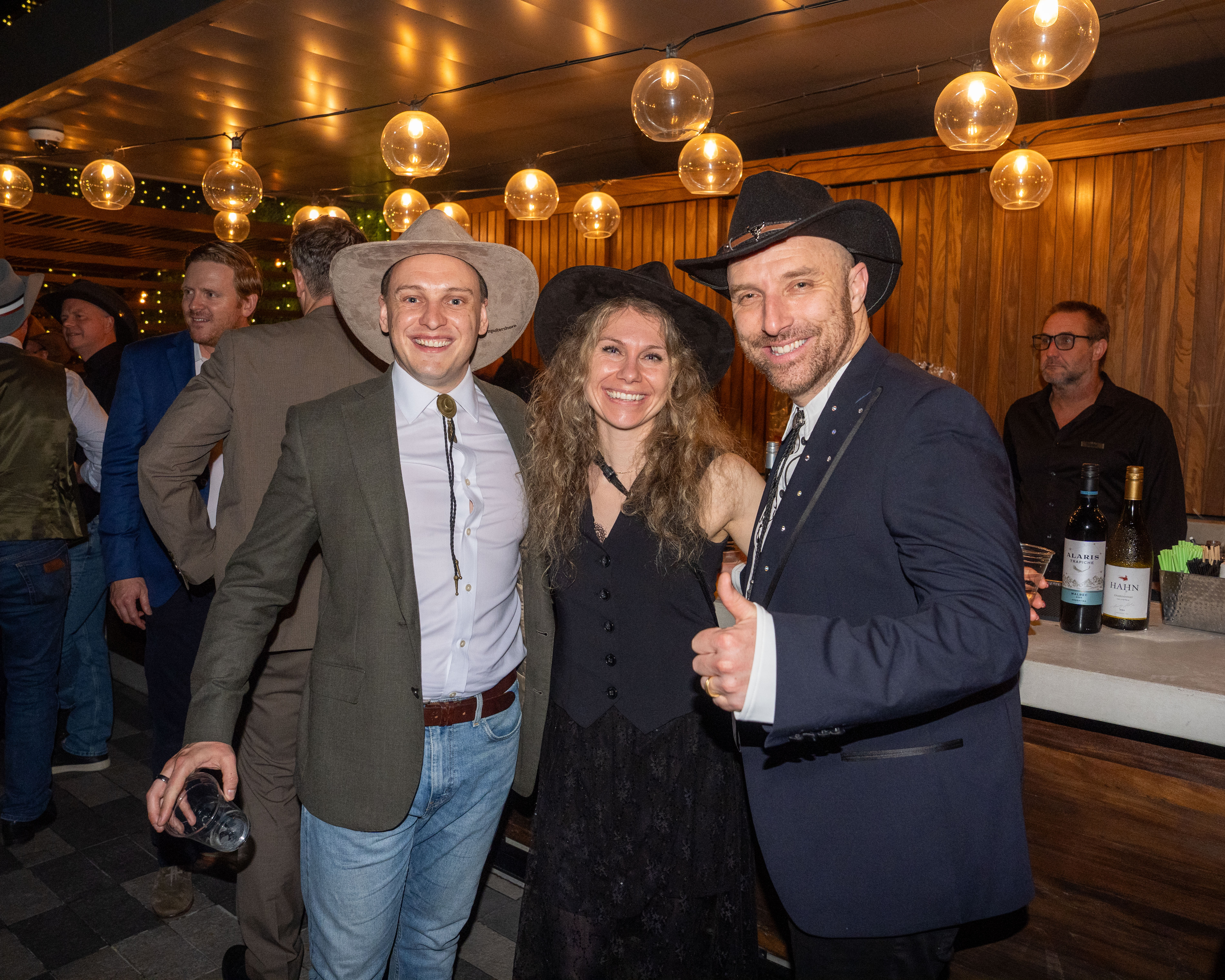 people in cowboy hats
