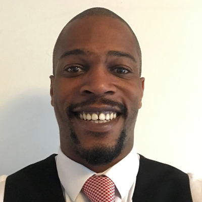 Man smiling in suit